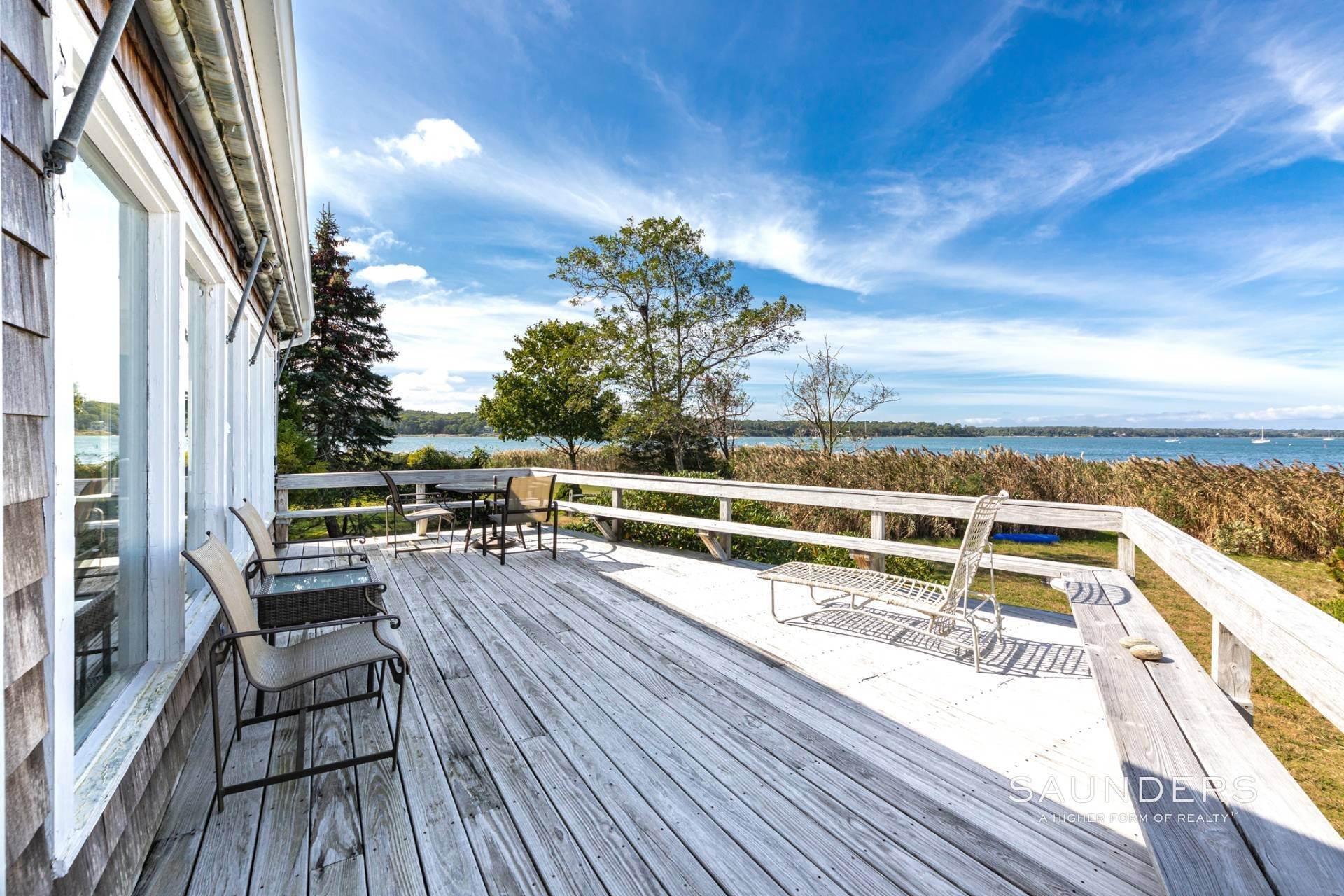12. Single Family Homes for Sale at Waterfront And Sunset Views On Three Mile Harbor 19 Breeze Hill Road, East Hampton, NY 11937
