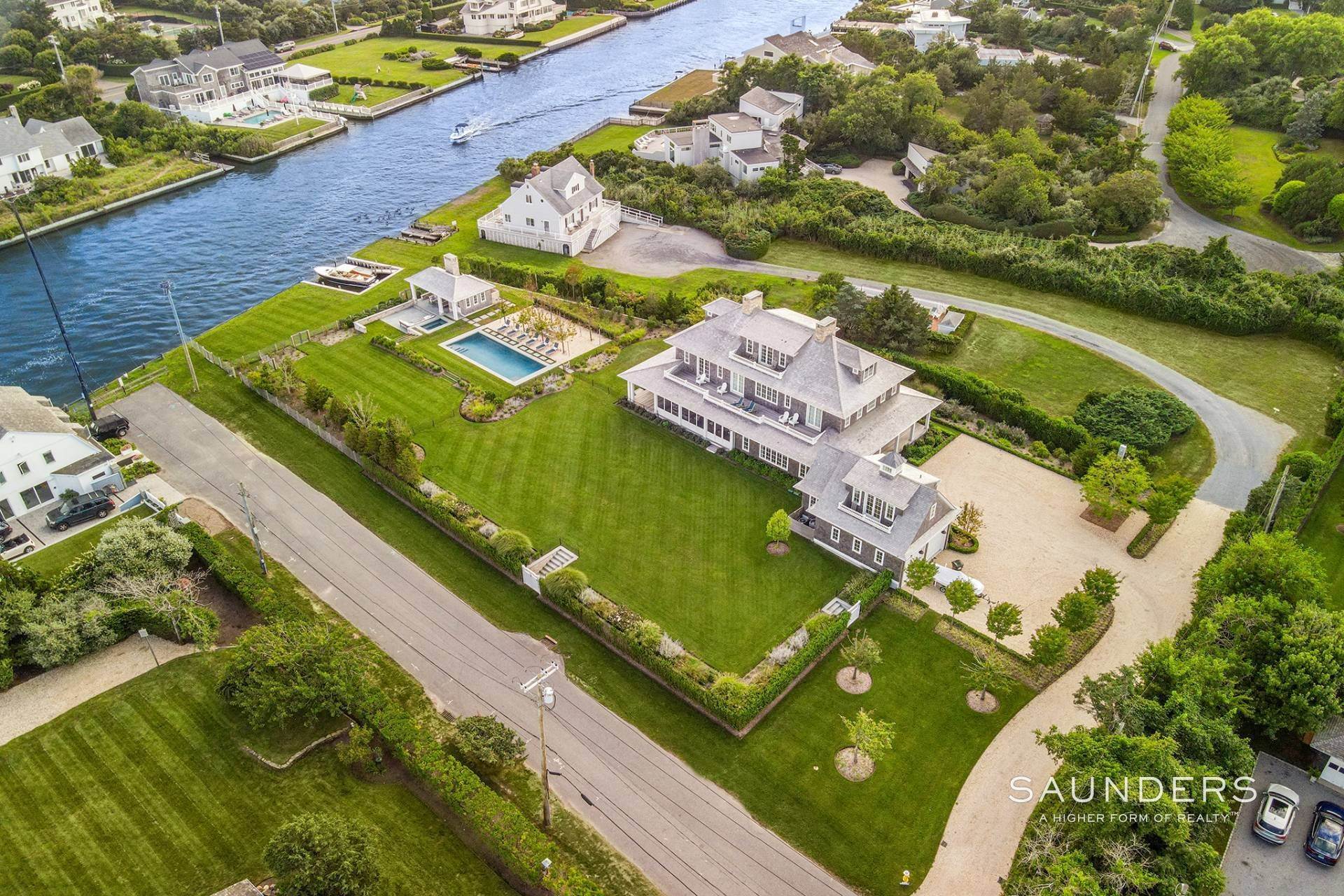 2. Single Family Homes at Quintessential Quogue Waterfront With Boat Slip, Pool, Spa 35 Beach Lane, Quogue, NY 11959