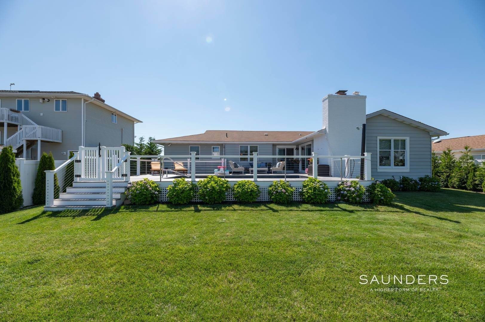 19. Single Family Homes at Hampton's Waterfront Rental - Steps To Private Beach 13 Marlin Road, East Quogue, NY 11942