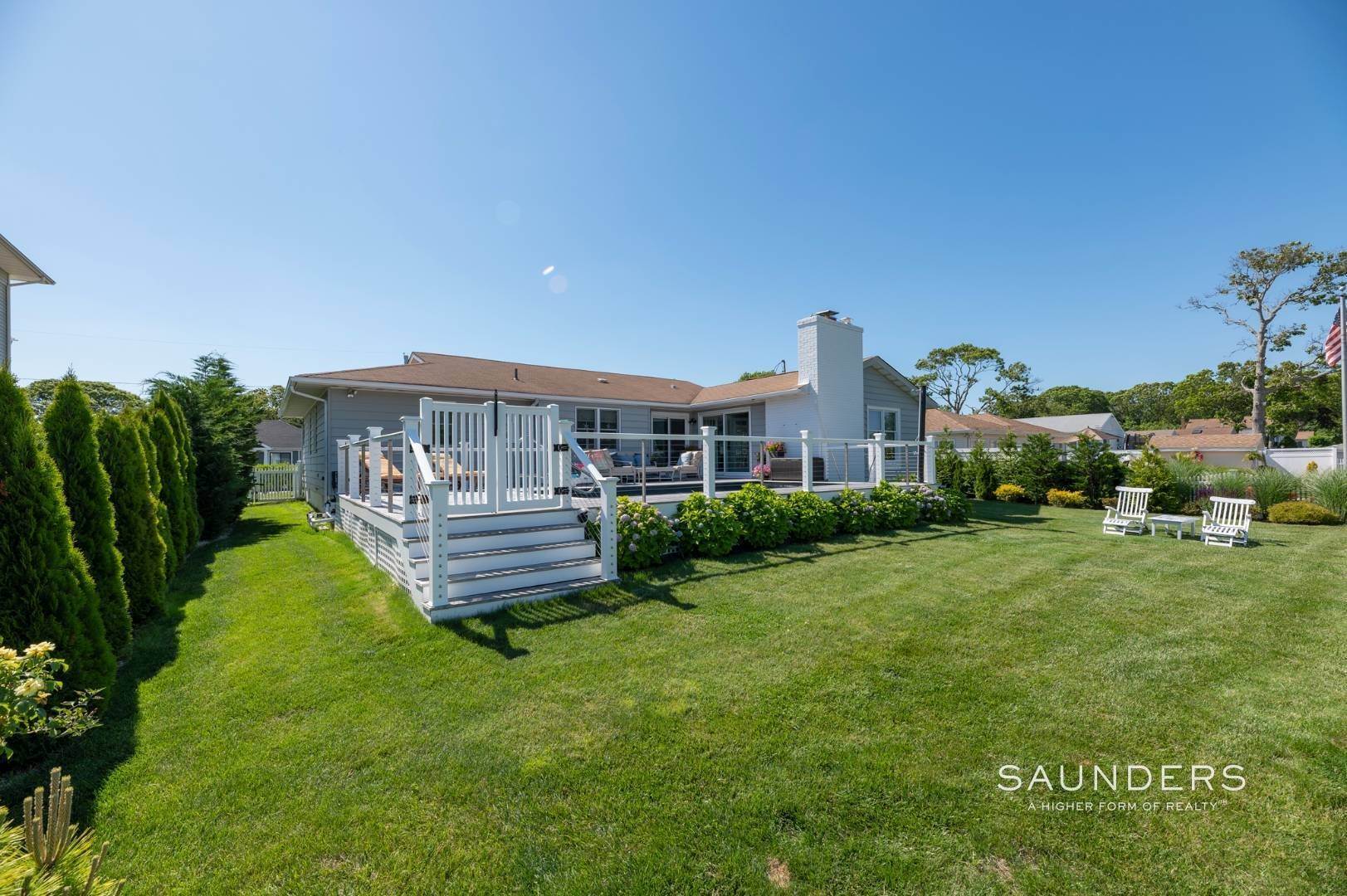 20. Single Family Homes at Hampton's Waterfront Rental - Steps To Private Beach 13 Marlin Road, East Quogue, NY 11942