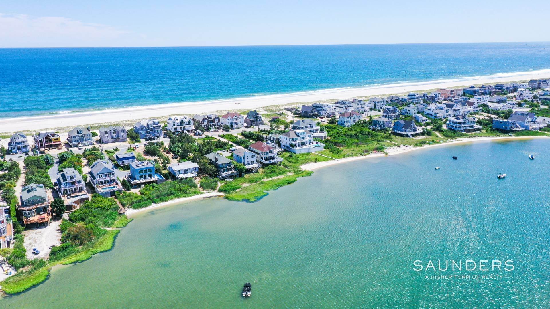 4. Single Family Homes for Sale at Waterfront Beauty With Sandy Bay Beach 854 Dune Road, Westhampton Dunes Village, NY 11978