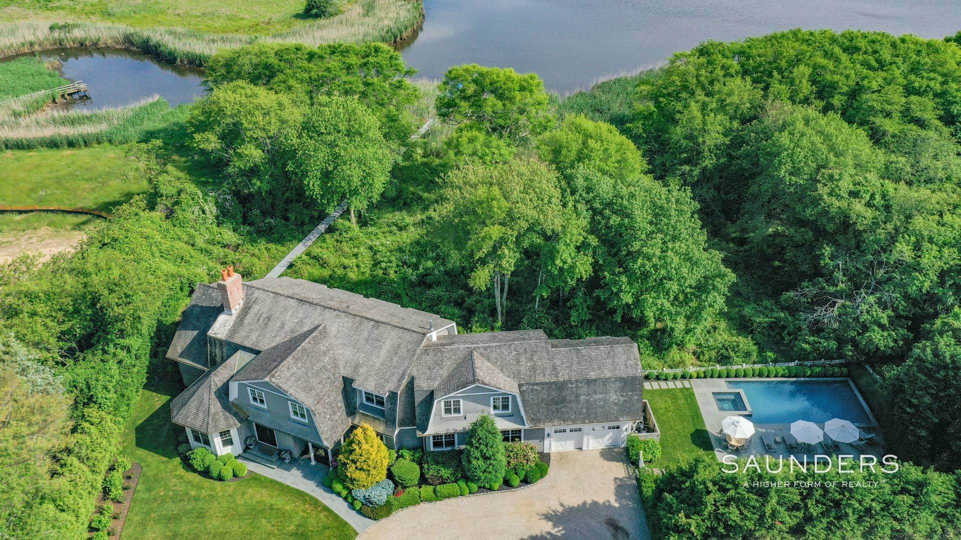 Single Family Homes for Sale at Exceptional Sagg Pond Waterfront With Dock 443 Sagaponack Road, Sagaponack, NY 11962