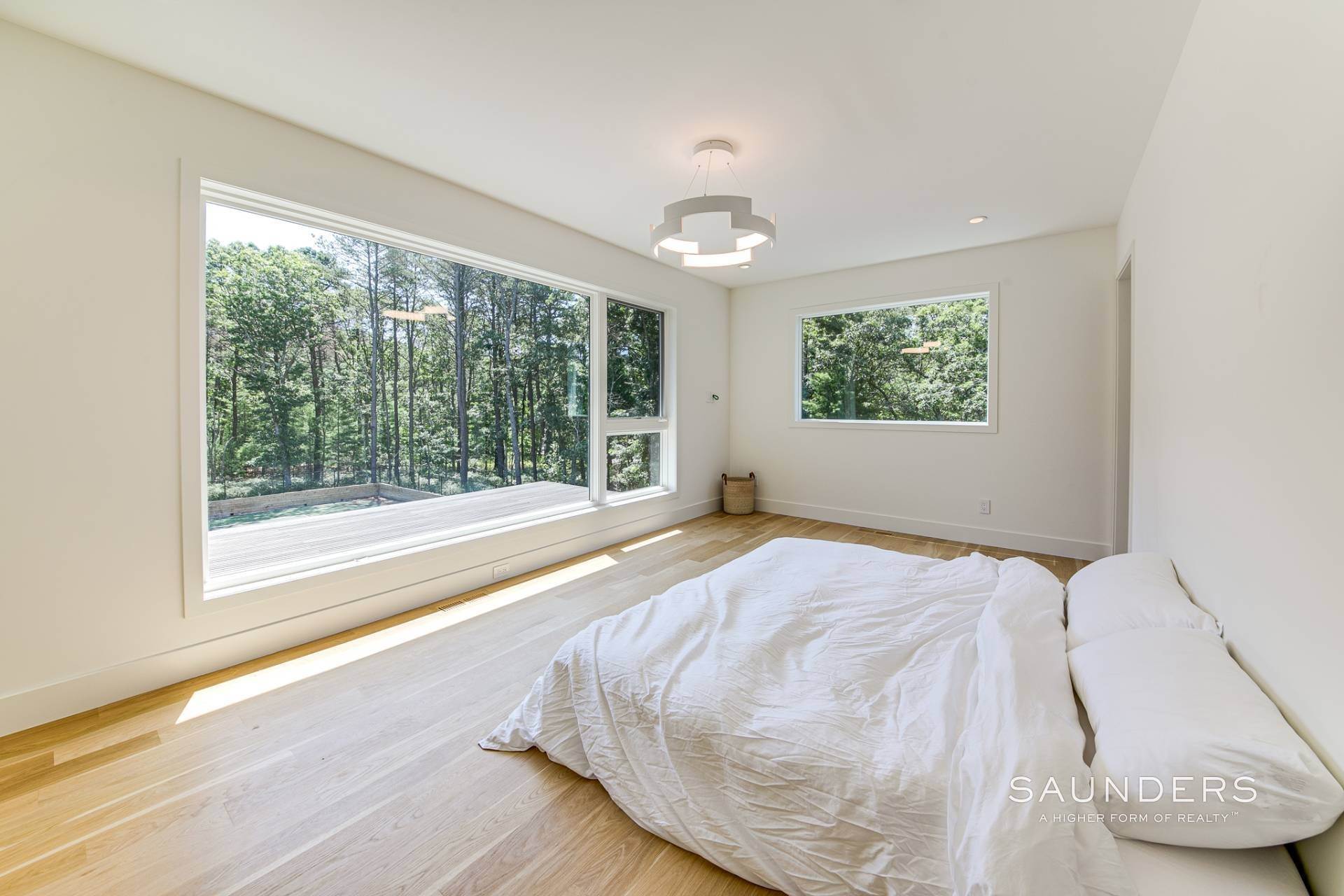21. Single Family Homes at All New Modern Retreat With Tennis 5 Two Holes Of Water Road, East Hampton, NY 11937