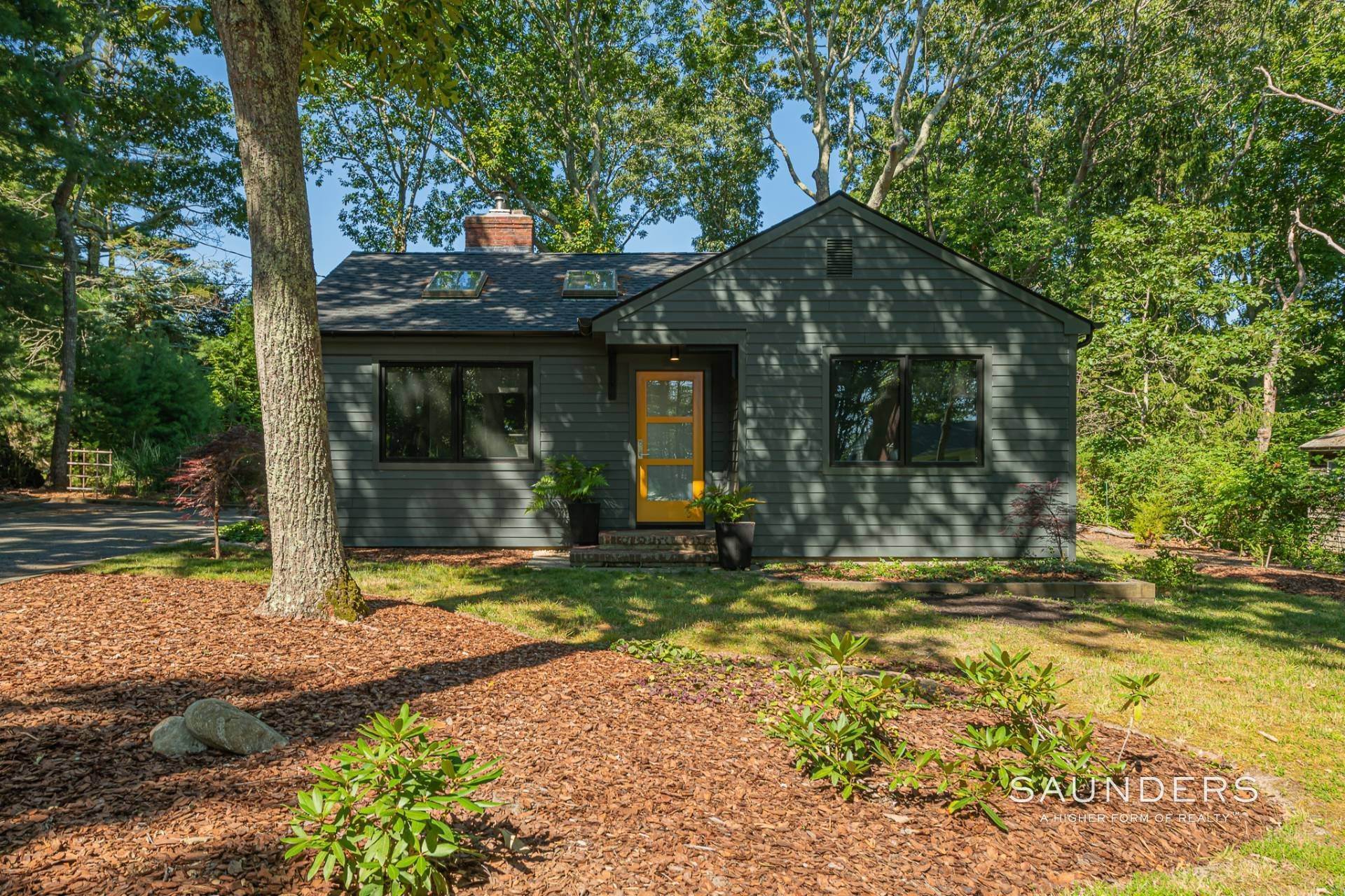 1. Single Family Homes for Sale at Chic Cottage Just Moments From Sag Harbor's Long Beach! 11 Butcher Lane, Sag Harbor, NY 11963