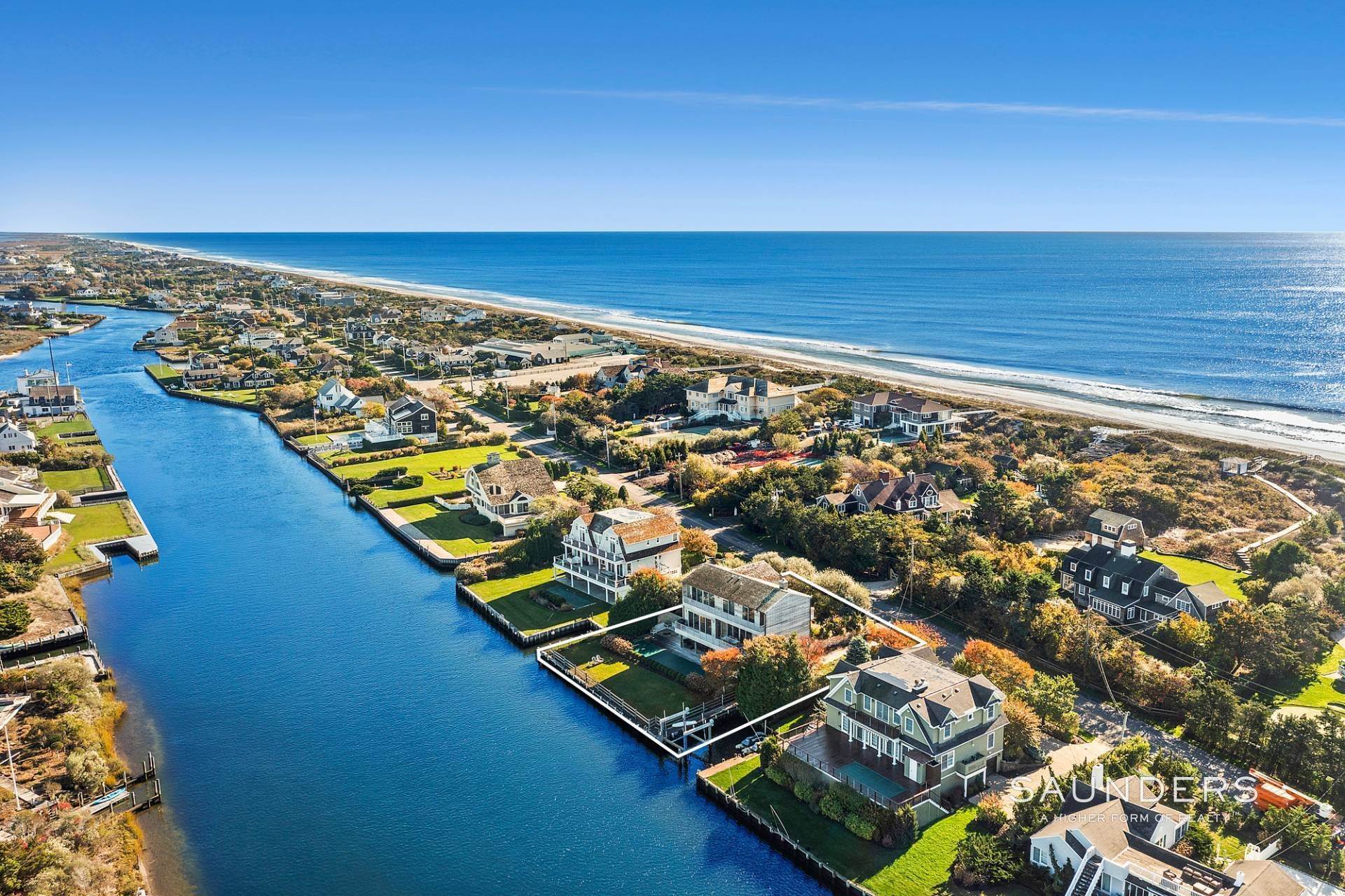 2. Single Family Homes for Sale at Dune Road Canalfront With 50' Lap Pool, Boat Slip & Ocean Access 43 Dune Road, Quogue, NY 11959