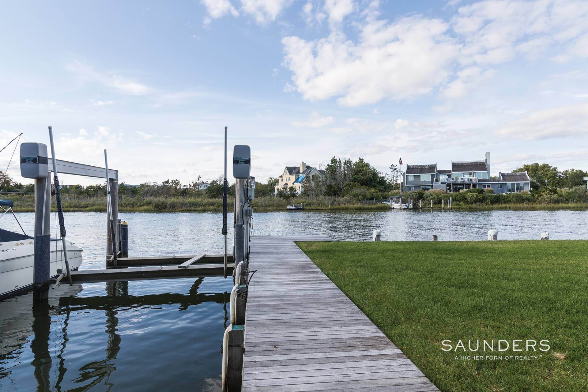 25. Single Family Homes for Sale at Dune Road Canalfront With 50' Lap Pool, Boat Slip & Ocean Access 43 Dune Road, Quogue, NY 11959