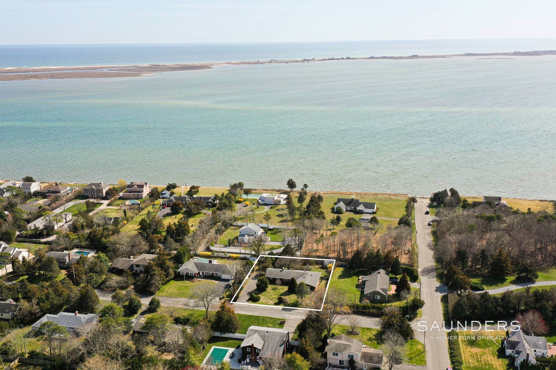 21. Single Family Homes for Sale at Rampasture Retreat With Water View 4 East Point Lane, Hampton Bays, NY 11946