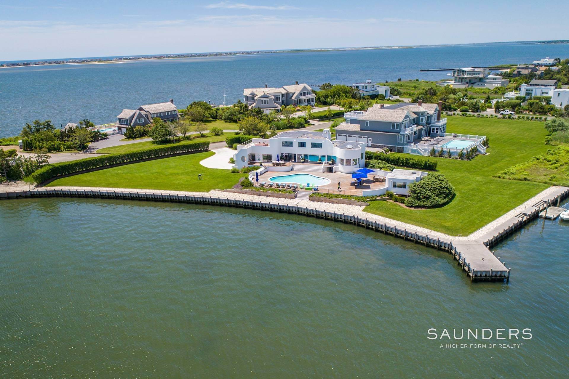 Single Family Homes for Sale at Luxe St. Barths Style Waterfront Villa In The Hamptons 16 Duck Point Road, Remsenburg, NY 11960