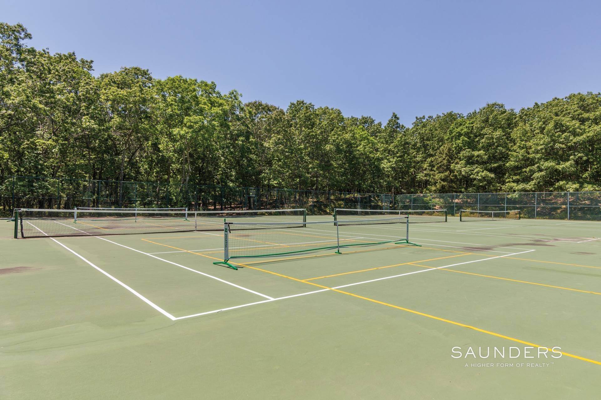 18. Condominiums at Easy Living In A Large Four Bedroom, Four Bath Condo With Tennis 197 Treescape Drive, Cluster 4, Unit 9b, East Hampton, NY 11937