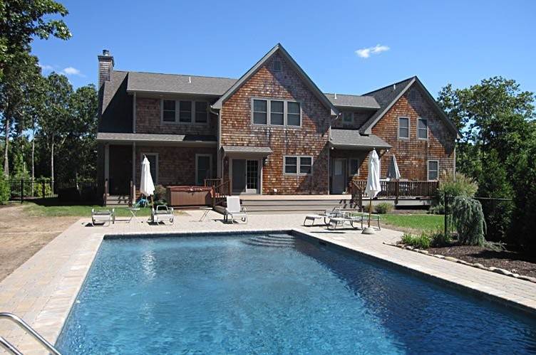 Single Family Homes at Traditional Home With A Pool Village Of Quogue Quogue, NY 11959